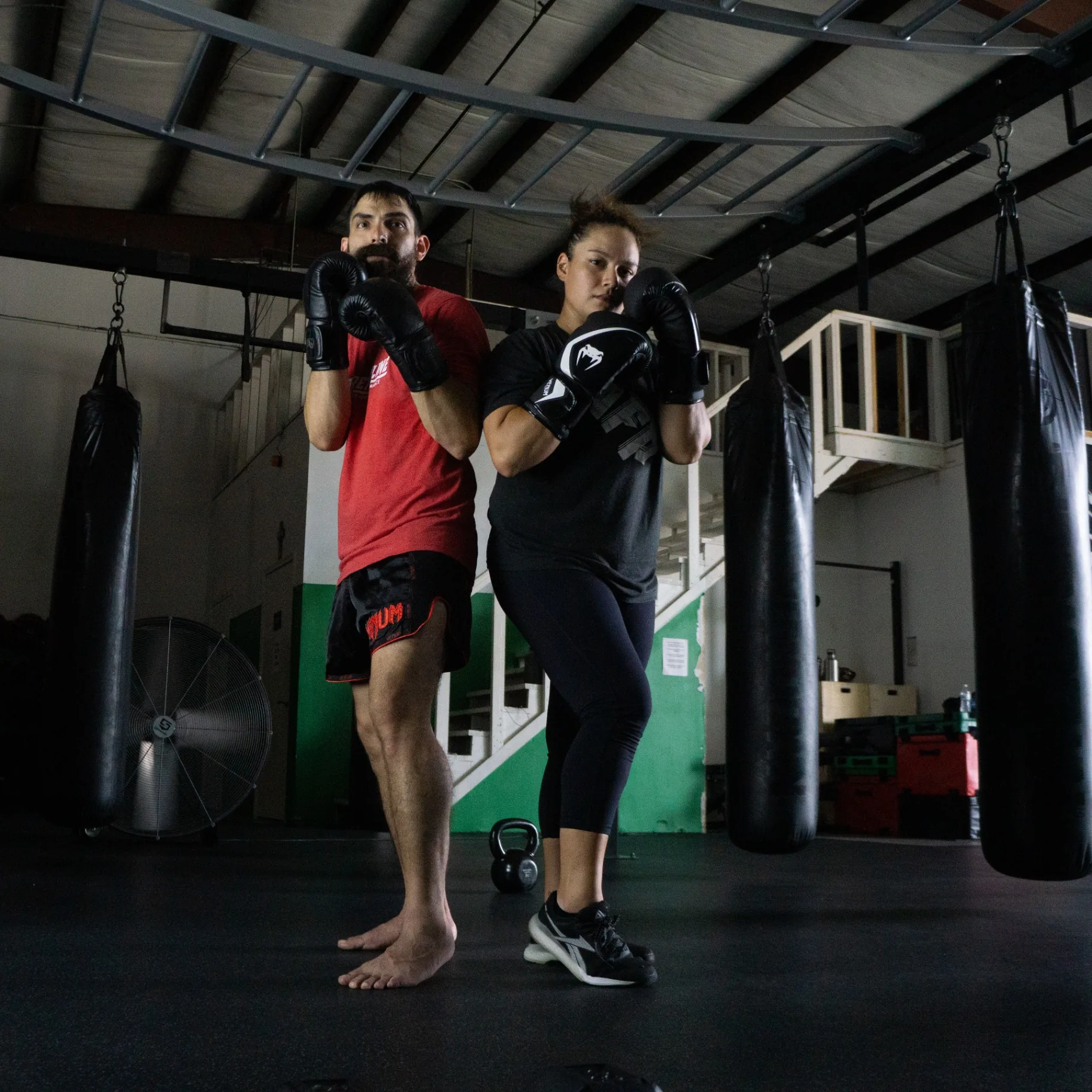 David & Evelyn Cantu, founders of Adrenaline Fitness and Performance, training in their Houston, TX gym